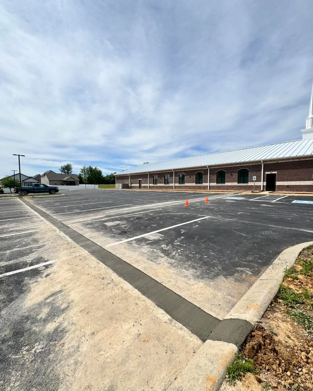 Concrete drainage channel in a Clarksville parking lot