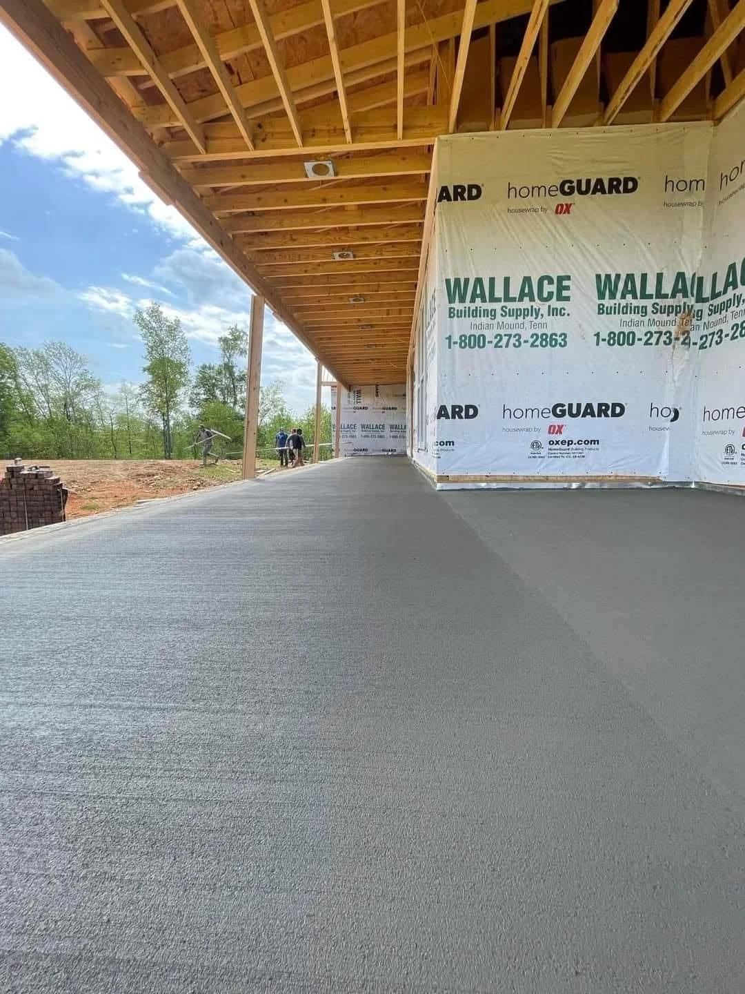 Concrete slab beneath a covered porch in Clarksville, TN