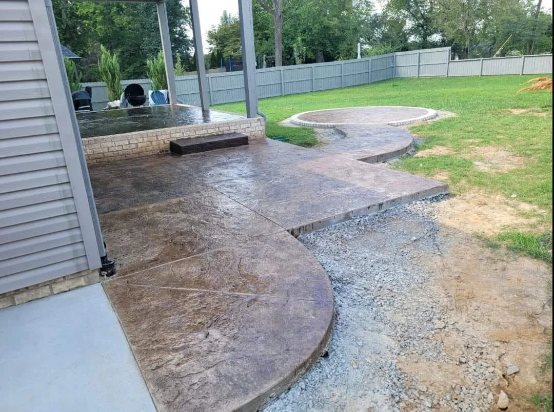 Curved stamped concrete patio in Clarksville, TN