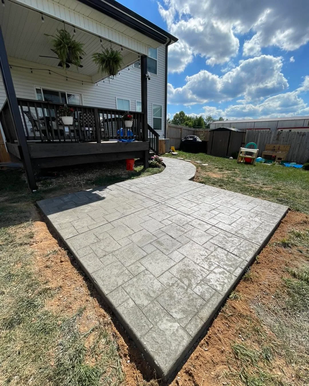 Stamped stone-border concrete driveway in St. Bethlehem, Clarksville TN